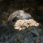 Walking through Indian Cave at Craters of the Moon National Monument, Idaho