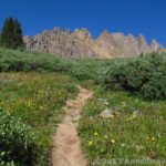 Hiking the Electric Pass Trail, Cathedral Peak comes into view. White River National Forest, Colorado.