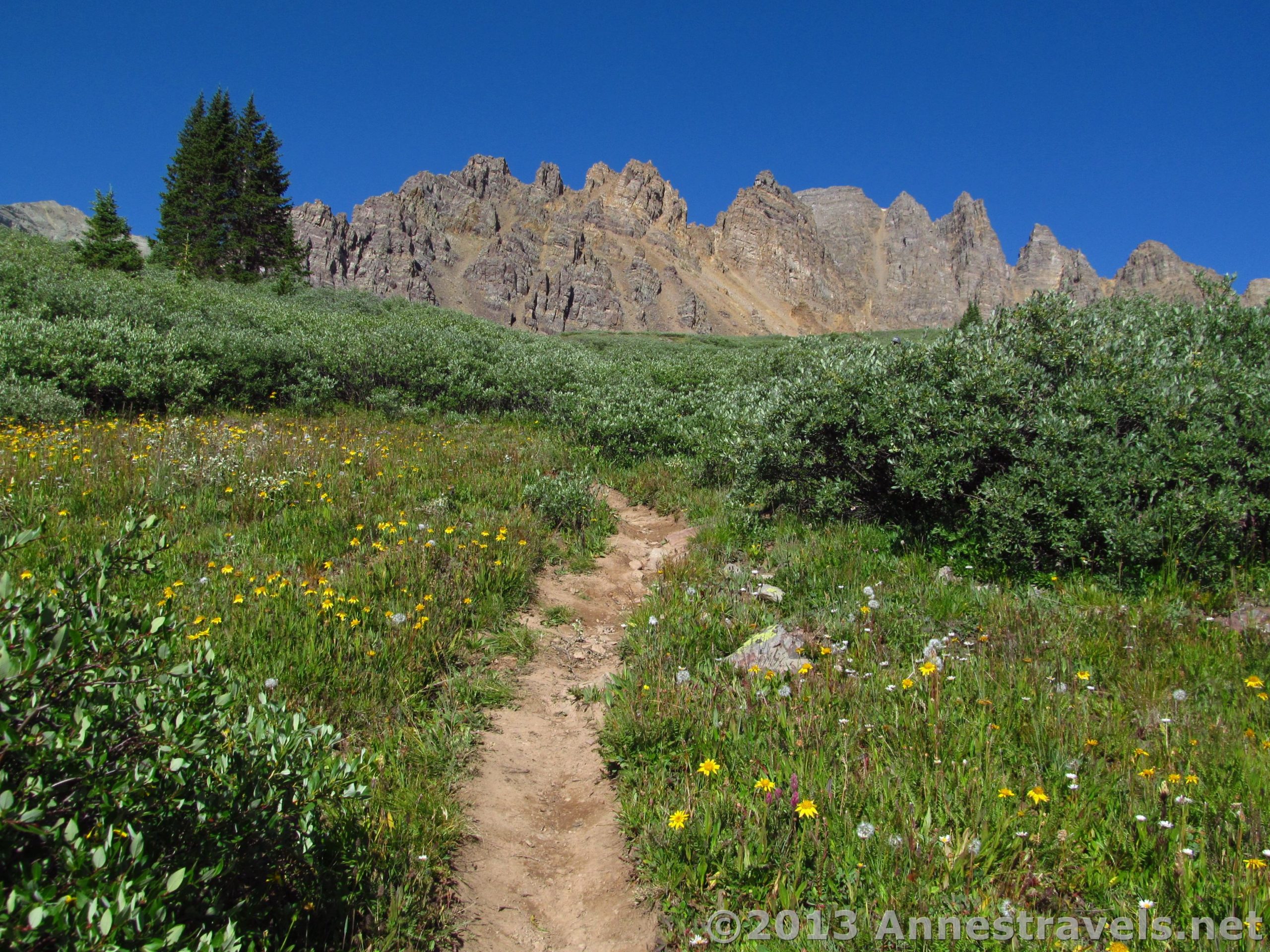 Hiking the Electric Pass Trail, Cathedral Peak comes into view. White River National Forest, Colorado.