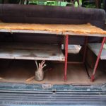 All the shelves in the van, ready for boxes, cooler, and camping supplies