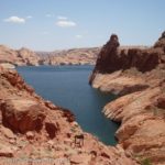 Scrambling down Hole in the Rock to Lake Powell, Glen Canyon Recreation Area, Utah