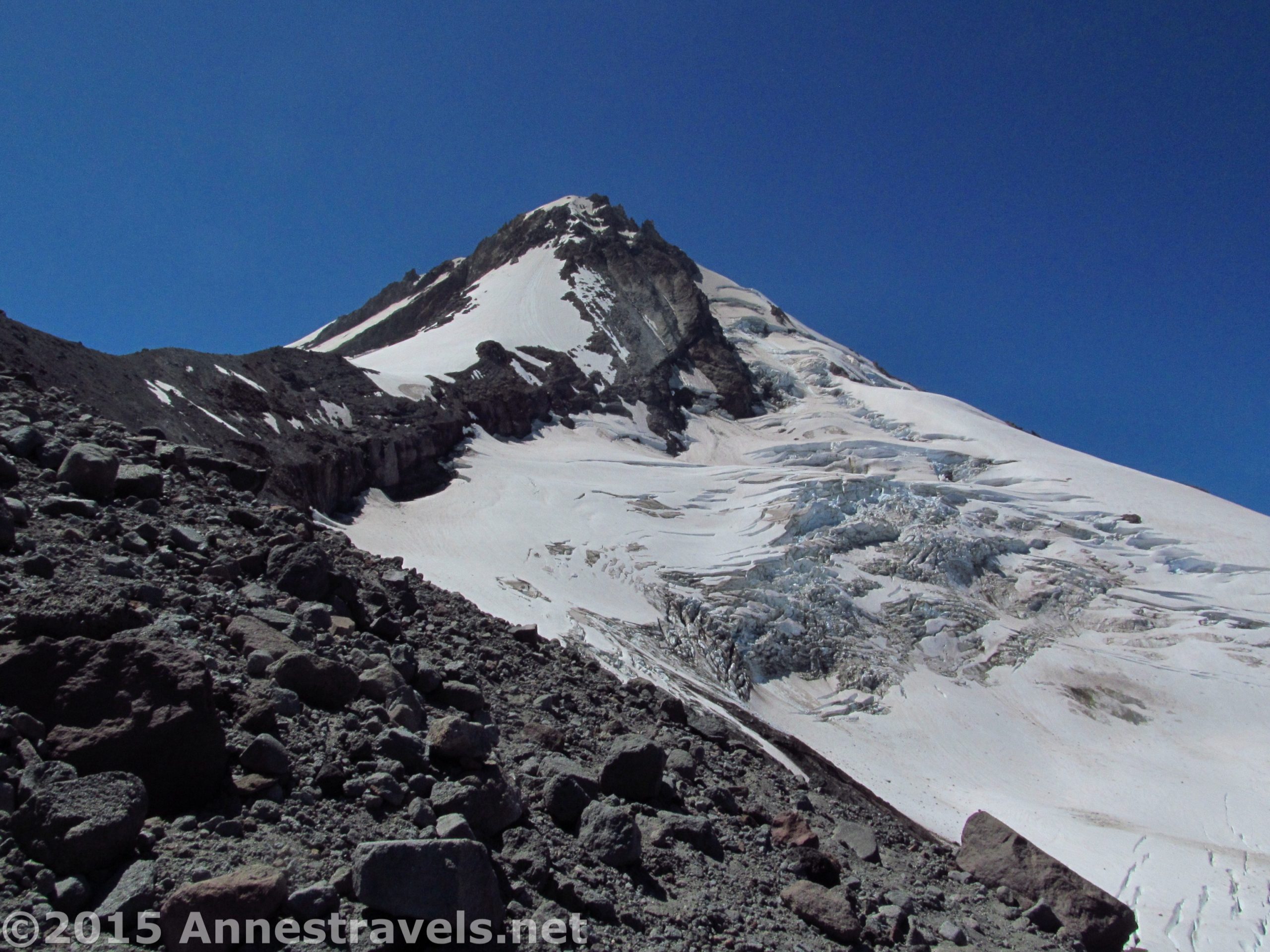 Mt. Hood stands grandly over the Elliot Glacier as seen from the Cooper Spur Trail, Mount Hood National Forest, Oregon