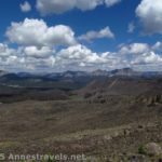 Lava fields stretch away from Lava Mountain, with Pinnacle Peak beyond. Near Togwotee Pass in Shoshone National Forest, Wyoming.