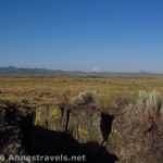 Mt. Shasta as seen across the Big Crack "Slot Canyon" in Lava Beds National Monument, California