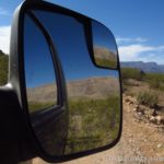 Views of the scenery surrounding the Whitmore Trail in the sideview mirror, Grand Canyon-Parashant National Monument, Arizona