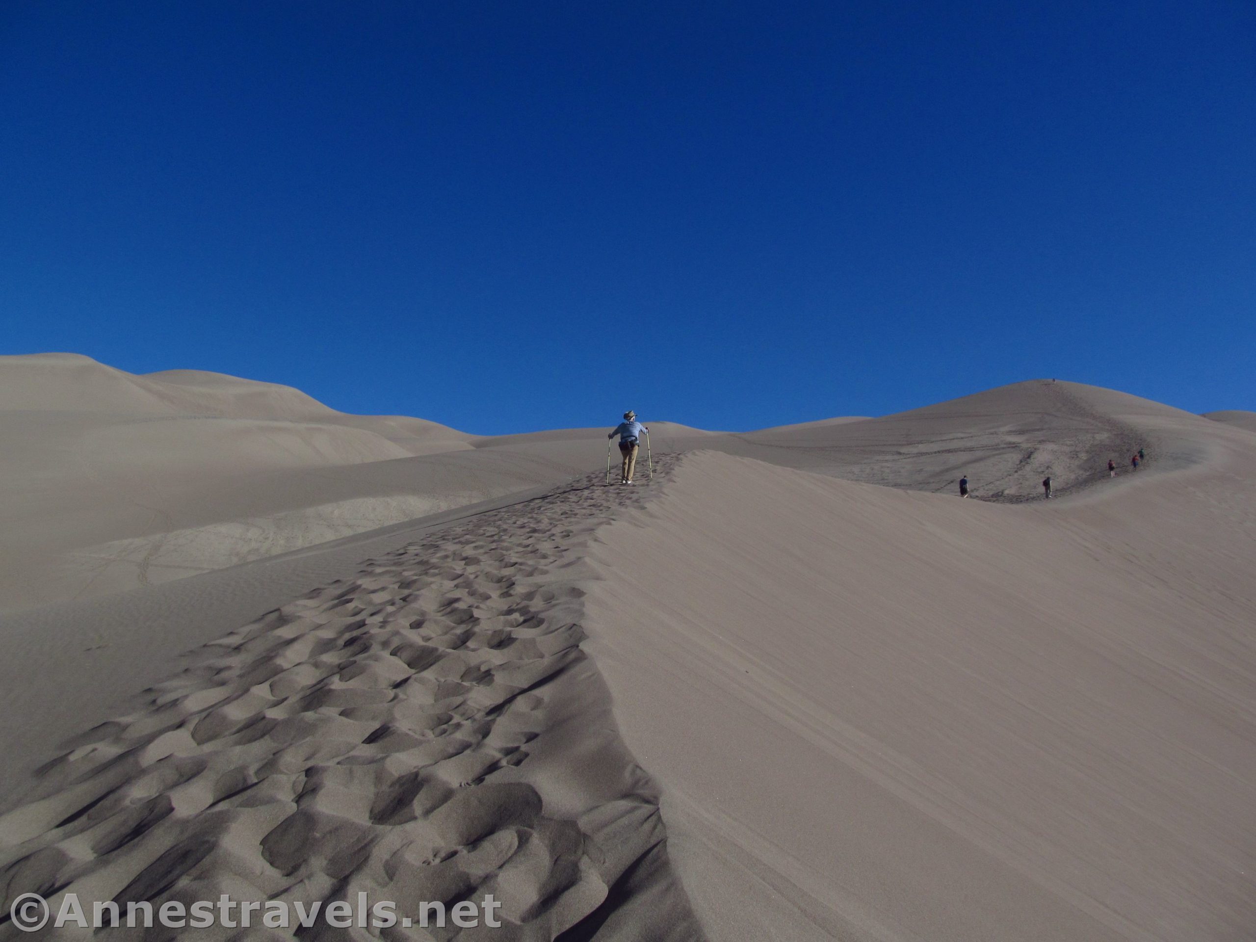 Climbing the Ridgeline en route to Star Dune, Great Sand Dunes National Park, Colorado