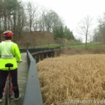 Crossing the bridge over a swamp in Durand Eastman Park on the Irondequoit Lakeside Trail near Rochester, New York