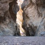 Entering a section of narrows in Grotto Canyon, Death Valley National Park, California