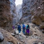 Hiking up one of the less-exciting slots in Sidewinder Canyon, Death Valley National Park, California