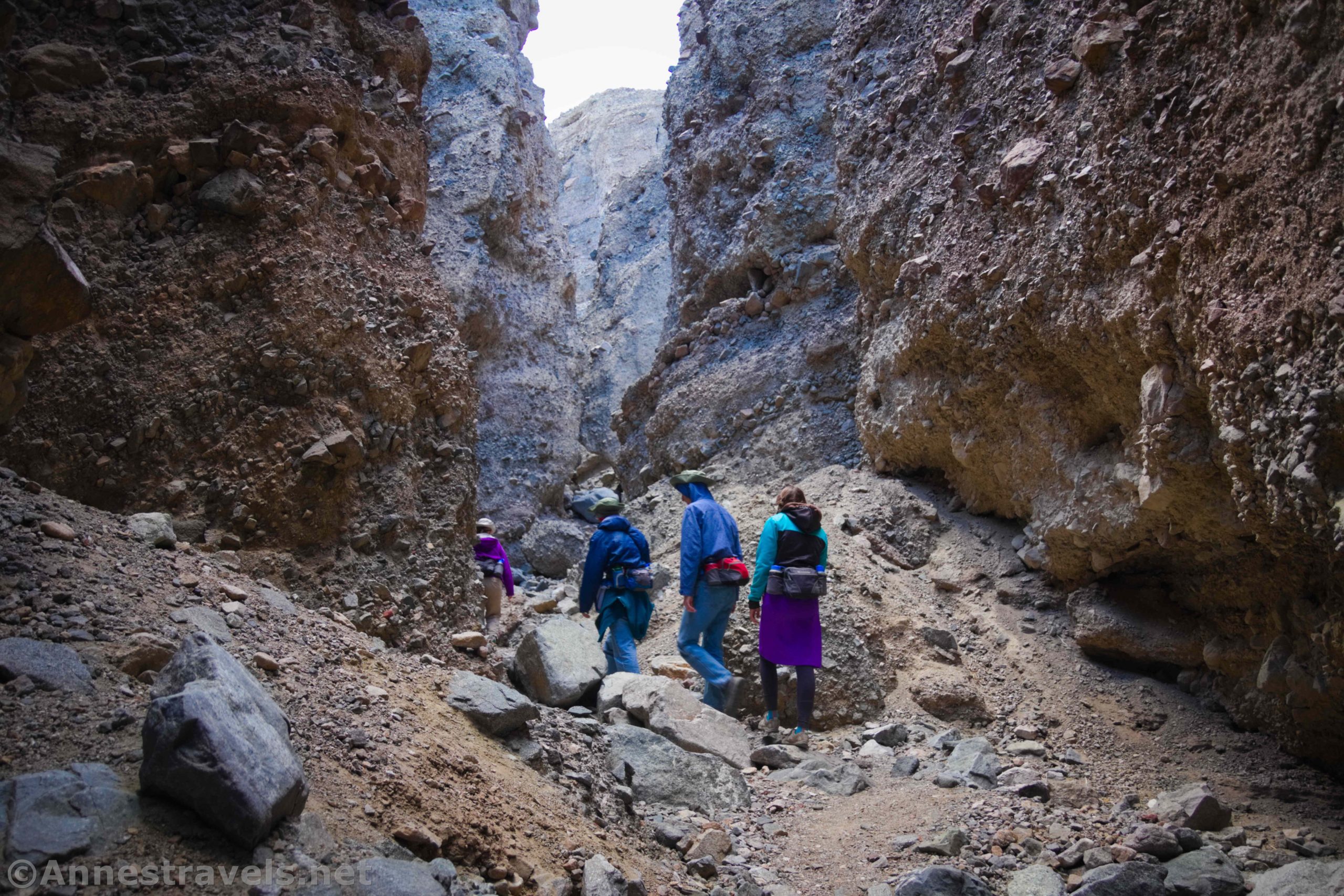 Hiking up one of the less-exciting slots in Sidewinder Canyon, Death Valley National Park, California