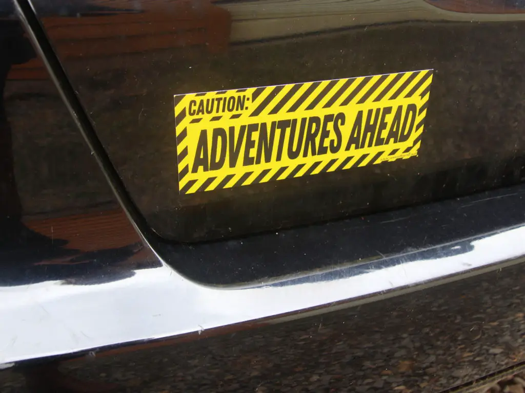 Caution: Adventures Ahead Car Magnet