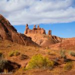 Three Sisters from Caramel Canyon en route to the Goblin's Lair in Goblin Valley State Park, Utah