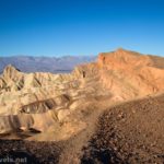 Hiking atop the Red Cathedral Canyon Crest with views to Manly Beacon, Death Valley National Park, California