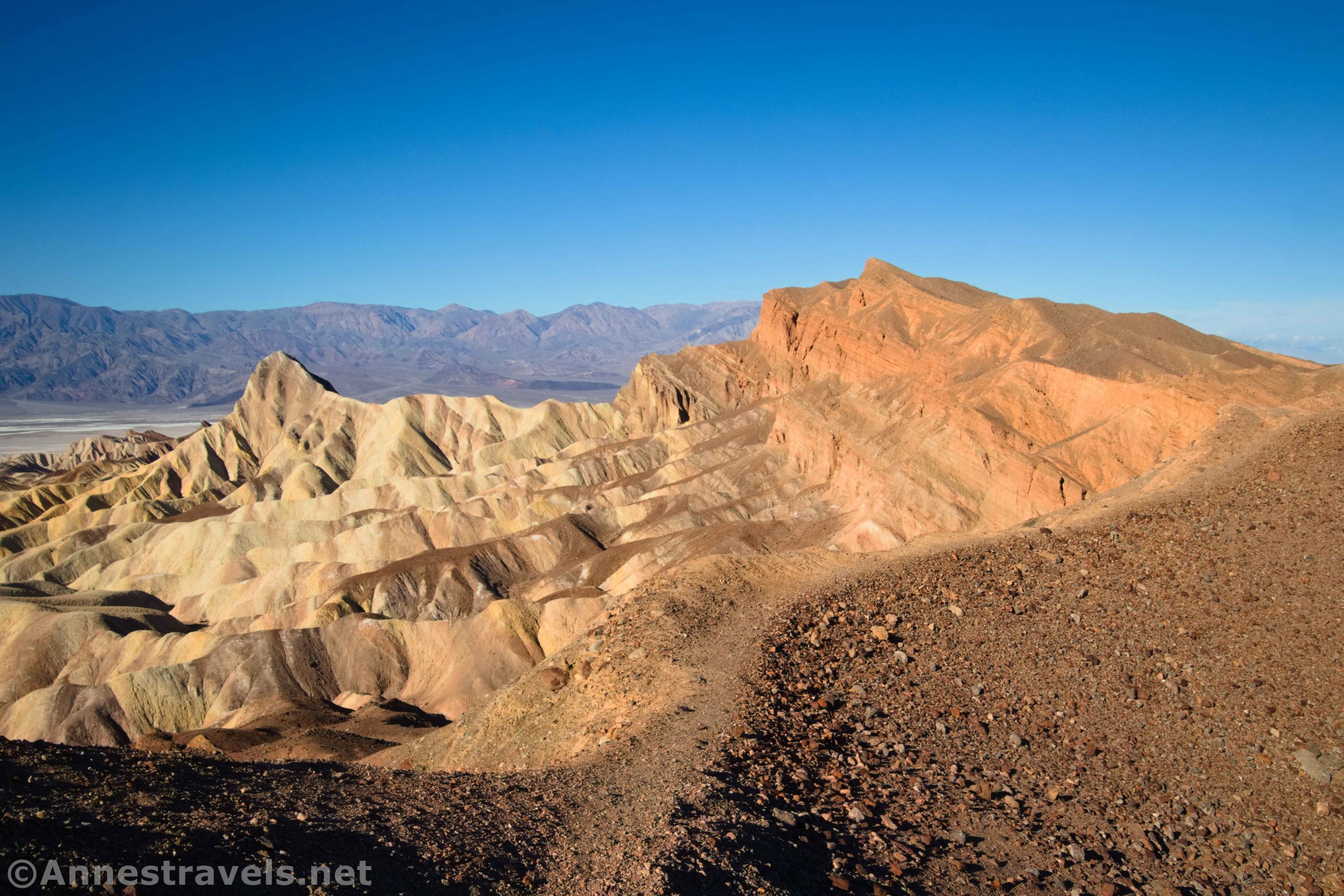 Hiking atop the Red Cathedral Canyon Crest with views to Manly Beacon, Death Valley National Park, California