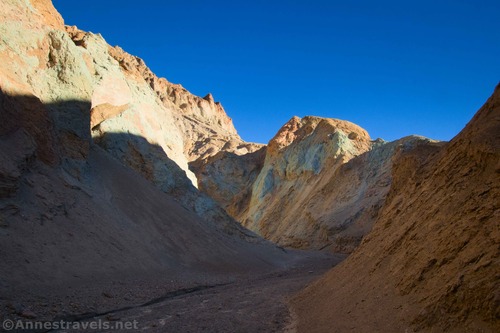 Colorful cliffs and rocks while hiking up Desolation Canyon, Death Valley National Park, California