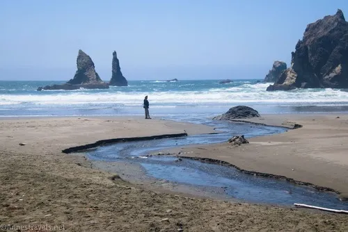 A hiker on China Beach, Samuel H. Boardman State Park, Oregon