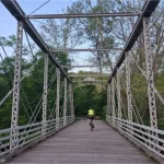 Riding across the old Station Road Bridge in Cuyahoga Valley National Park, Ohio