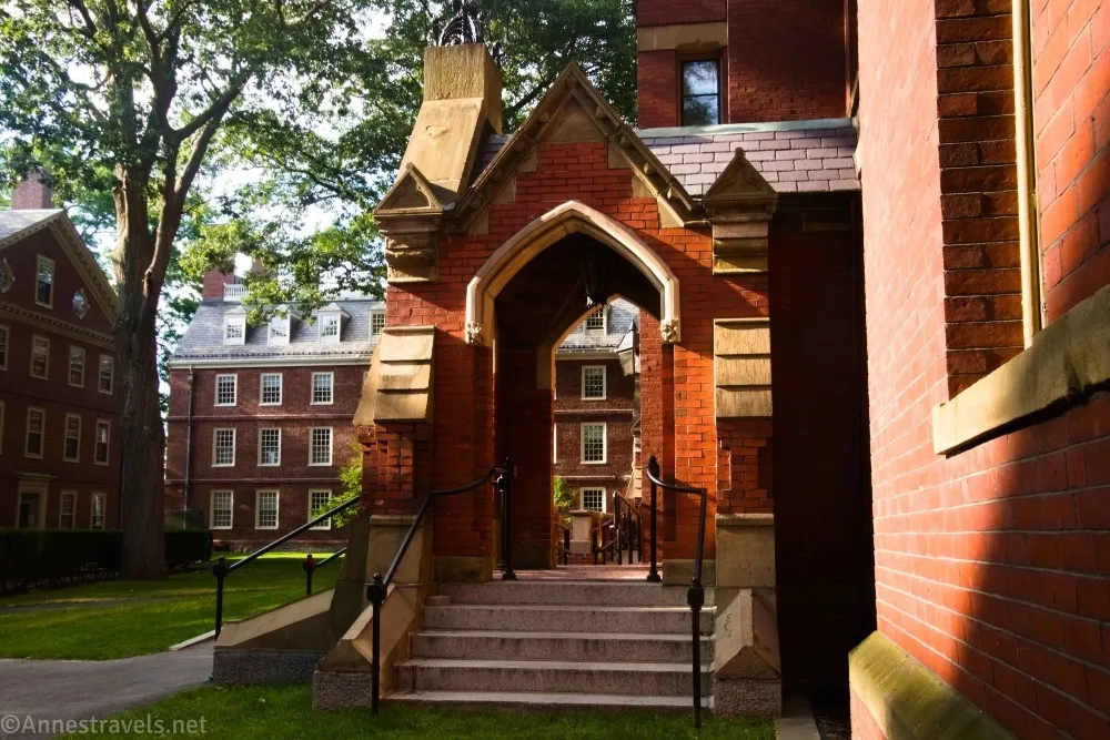 A red brick entryway to a brick building at Harvard