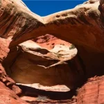 An arch that is yellow on top and red below