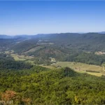 A green valley between green mountains from Tinker Cliffs in Virginia