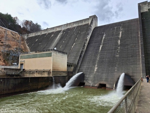 The Philpott Dam in Virginia from below with views to the two jets of water and the Smith River below the dam